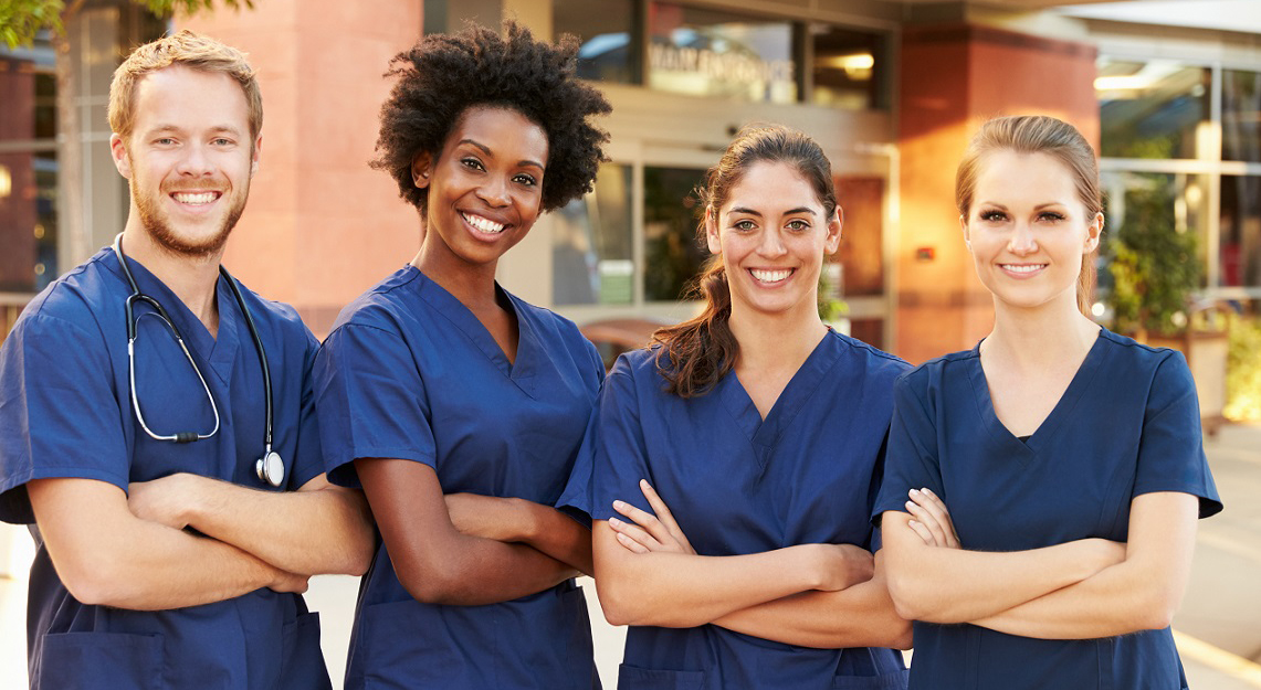 Portrait Of Medical Team Standing Outside Hospital Portrait Of Medical Team Standing Outside Hospital